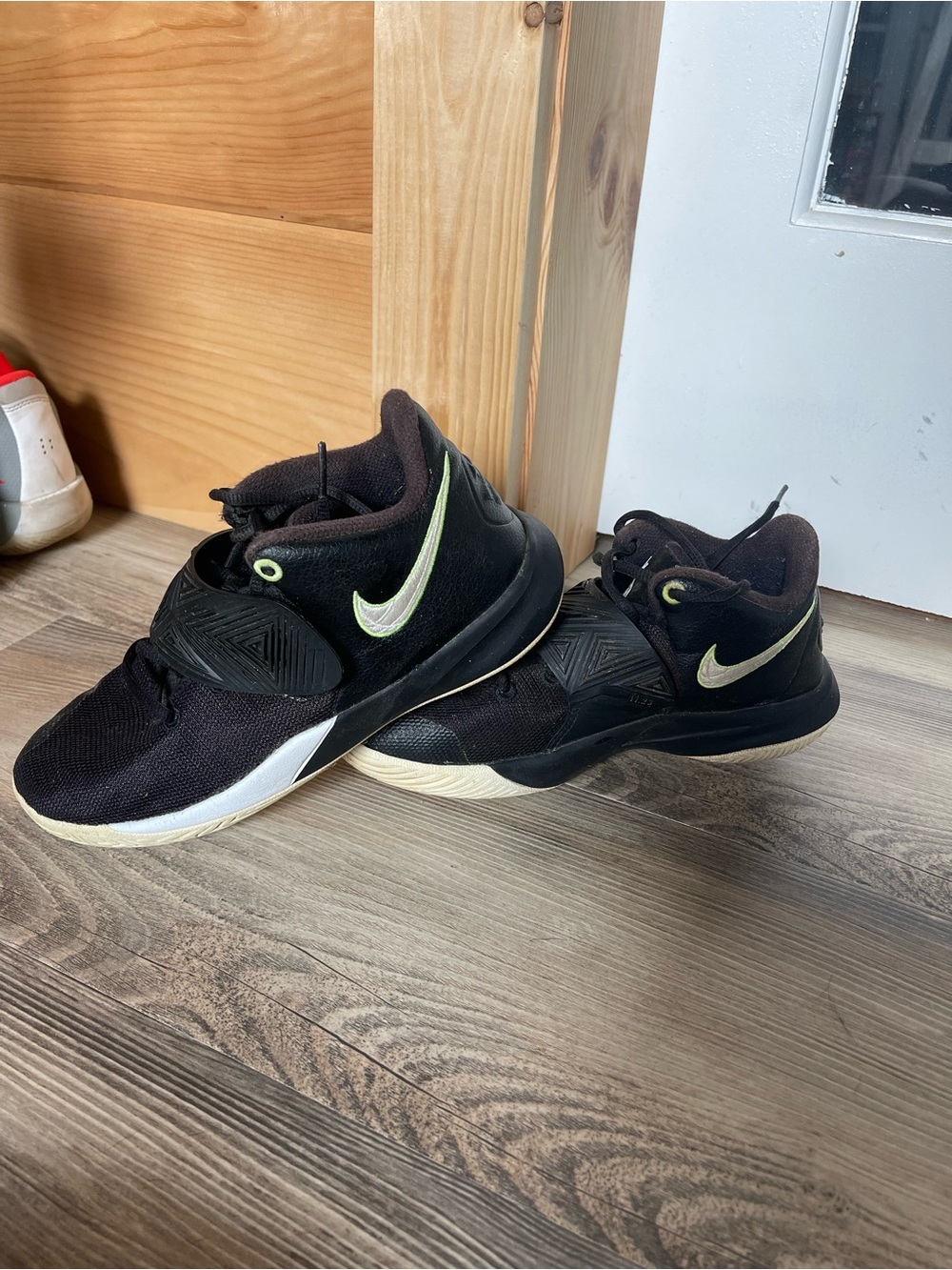 Nike Kids Black Sneakers with Lime Accent Swoosh